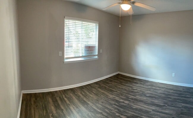 Building Photo - Just off the main road, but in walking dis...