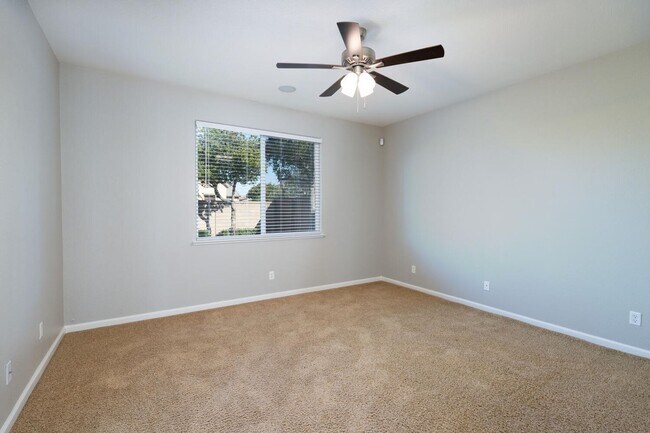 Building Photo - Harlan Ranch Home with Yard for Lease