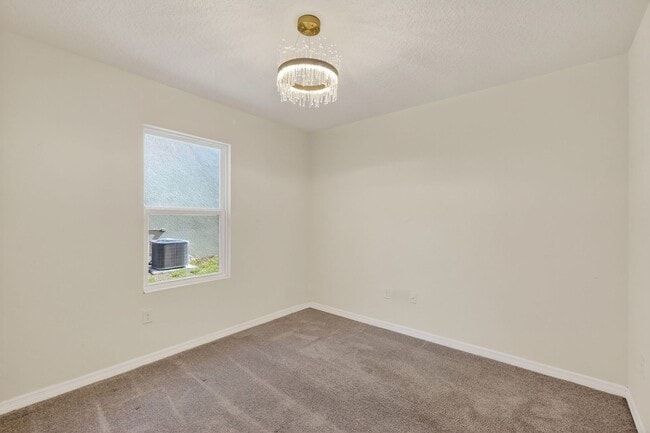 Building Photo - Available Now in Tavares | 2023 Built 4BR/2BA Home with 2-Car Garage