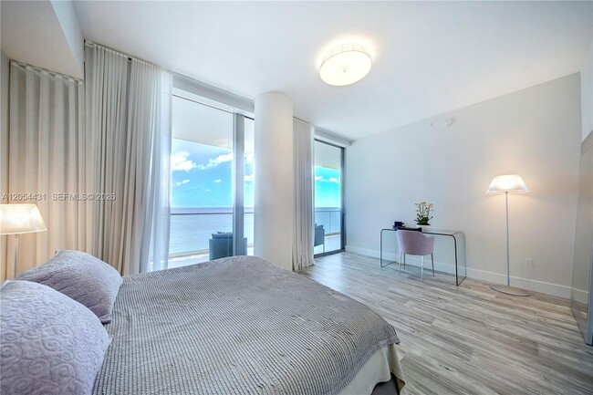 Building Photo - 10203 Collins Ave