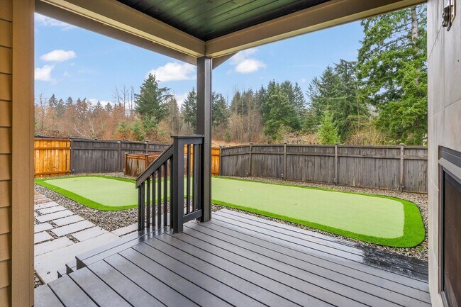 Building Photo - Backyard Putting Green + Outdoor Fireplace | Comfortable Puyallup Rental