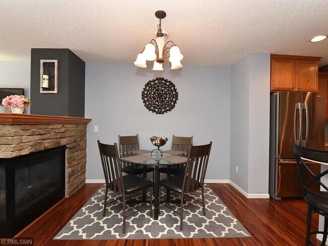 Building Photo - 3 Bedrooms | Loft | Upper-Level Laundry | 3-Sided Fireplace | Woodbury