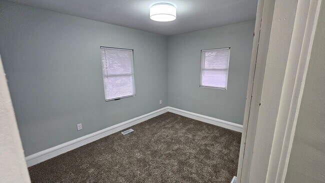 Building Photo - Stunning Renovation Ready for Your Finishing Touches!