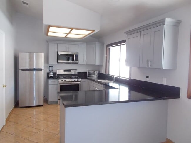 Building Photo - Stylishly Updated Single-Story 4BD Home with Sparkling Pool & Covered Patio Retreat