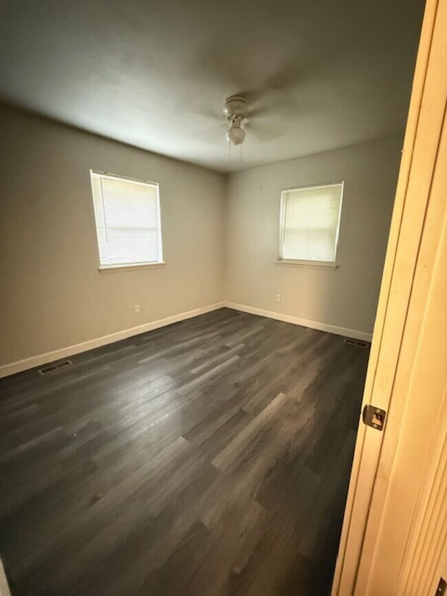 Building Photo - 3 bedrooms - 1.5 baths - Wood-look Floors ...