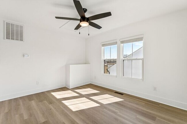 Building Photo - High-End 2BR Townhome | Rooftop Terrace + 2-Car Garage | 24-Unit Community