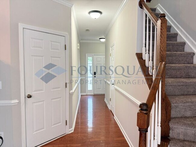 Building Photo - Lovely 3-Bedroom Townhome with Fireplace, Back Patio  & Community Amenities Included! Convenient ...