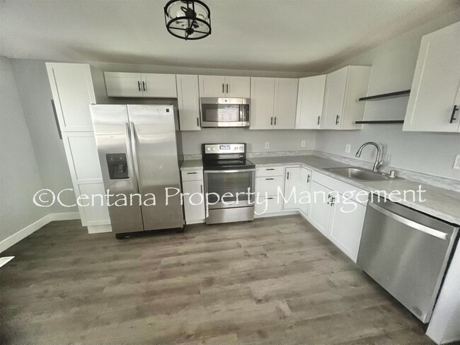 Building Photo - This remodeled two bedroom has all new everything including high end stainless steel appliances.