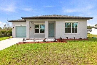 Building Photo - Brand New 4-Bedroom Gem with 2 Full Baths on Large Lot in Lehigh Acres – A Perfect Family Haven!