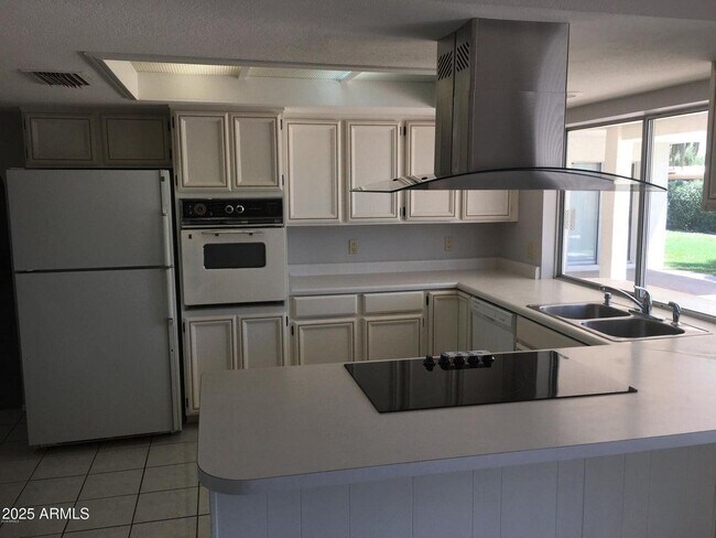 Building Photo - 5623 E Aster Dr
