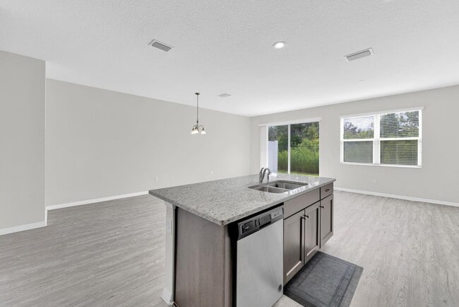 Building Photo - 6321 Tillandsia Pl