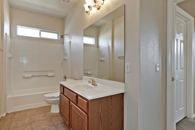 Building Photo - THIS 2 STORY HOME IN A GATED COMMUNITY HAS...