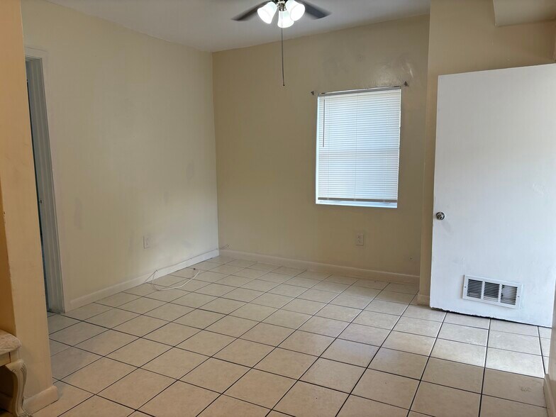 To the right of entry the dinning/livingroom - 209 NW 28th Ave