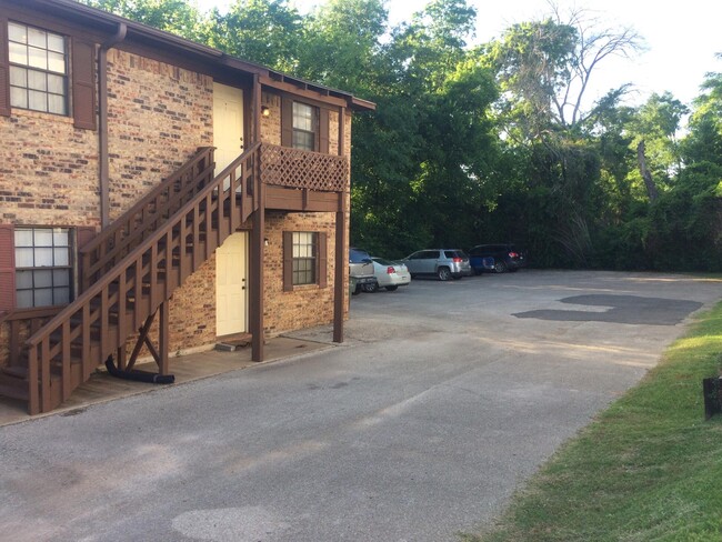 Parking area with security lights - 120 W California St