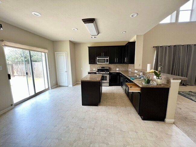 Building Photo - 10831 Woodwind Shadows Dr