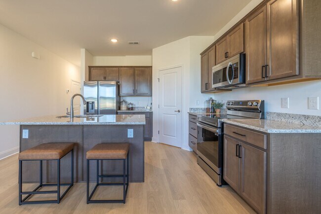 Building Photo - NEWLY RENOVATED + Washer and Dryer Included!