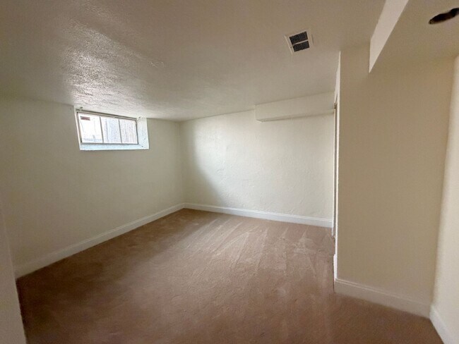 Building Photo - Classic Wash Park Gem with Detached Garage, Finished Basement & Stunning Great Room Addition