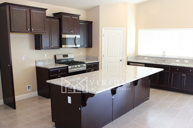 Building Photo - 5901 Blue Spruce Ave