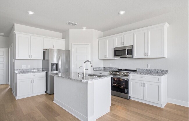 Building Photo - "Charming 3-Bedroom Duplex in San Antonio with Granite Elegance!"