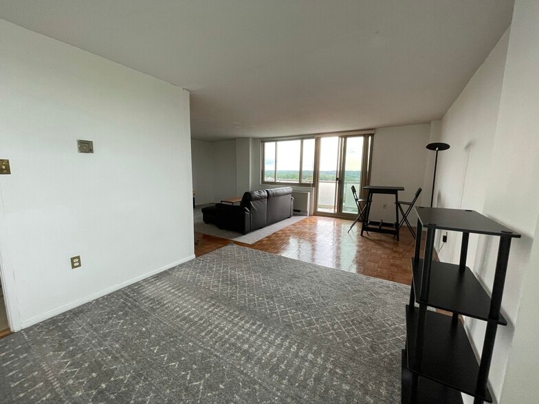 Dining and Couch Area - 1 E University Pky