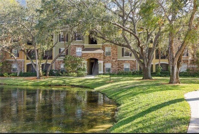 Building Photo - 10125 Courtney Palms Blvd