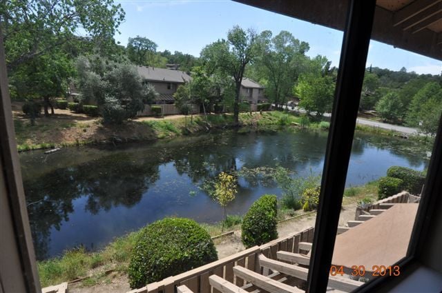 Pond in Back of Townhome. View from Primary Bedroom  & outside the private back patio area. - 13059 Lincoln Way
