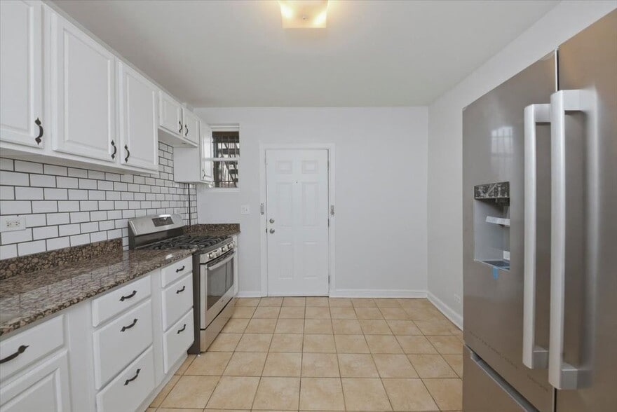 Building Photo - 6541 S Woodlawn Ave