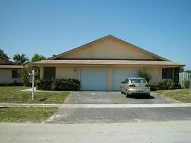Primary Photo - Charming 3-Bedroom Home with Spacious Backyard in N. Lauderdale, FL with Special Deposit $1,500 w...