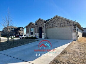 Building Photo - Available August 8: Four Bedroom House on Corner Lot