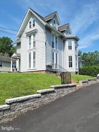 Building Photo - 20 W College Ave