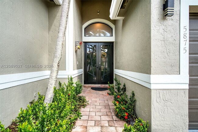 Building Photo - 5875 NW 123rd Ave