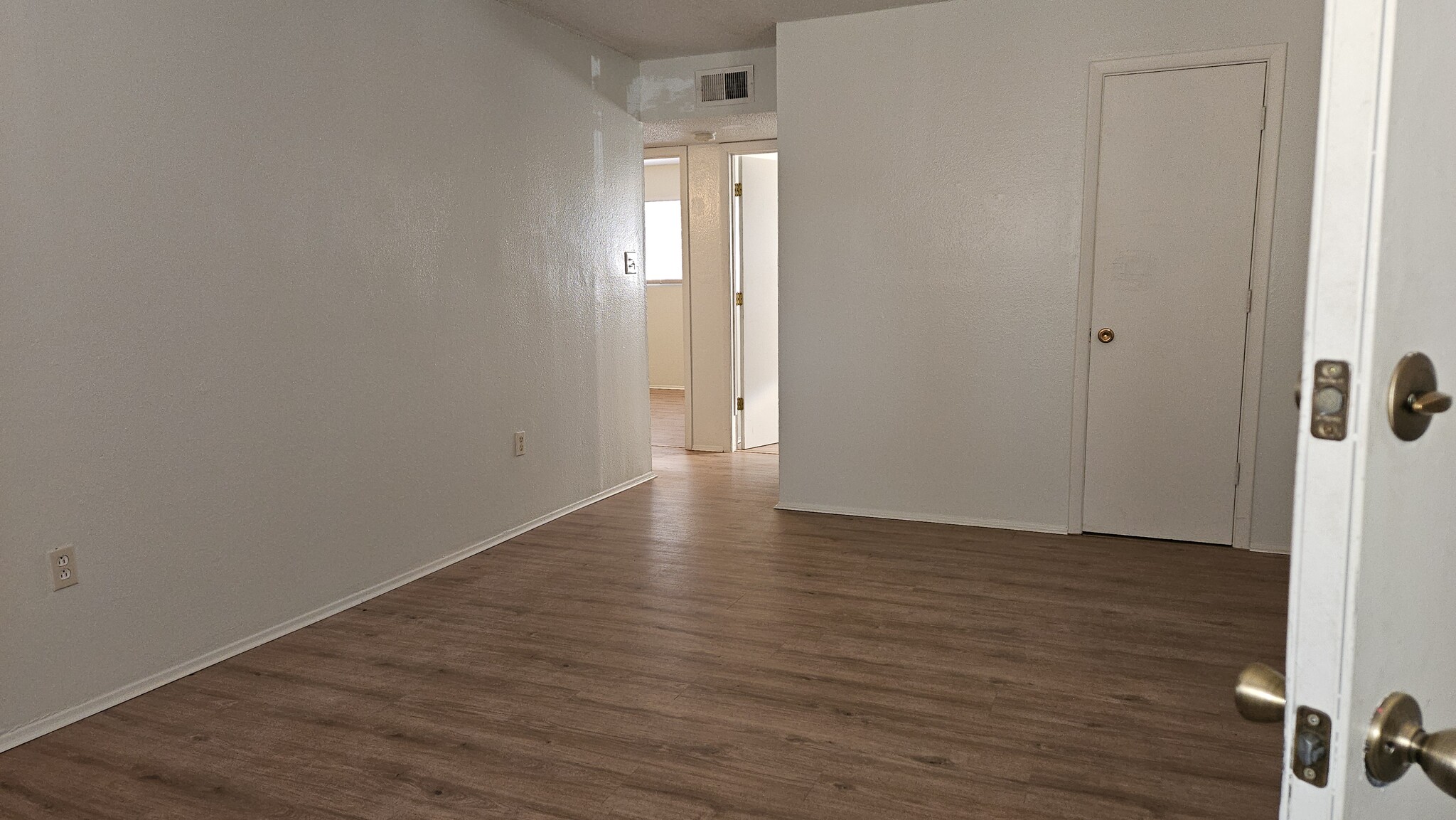 Living room toward bedrooms. - 544 Chama St SE
