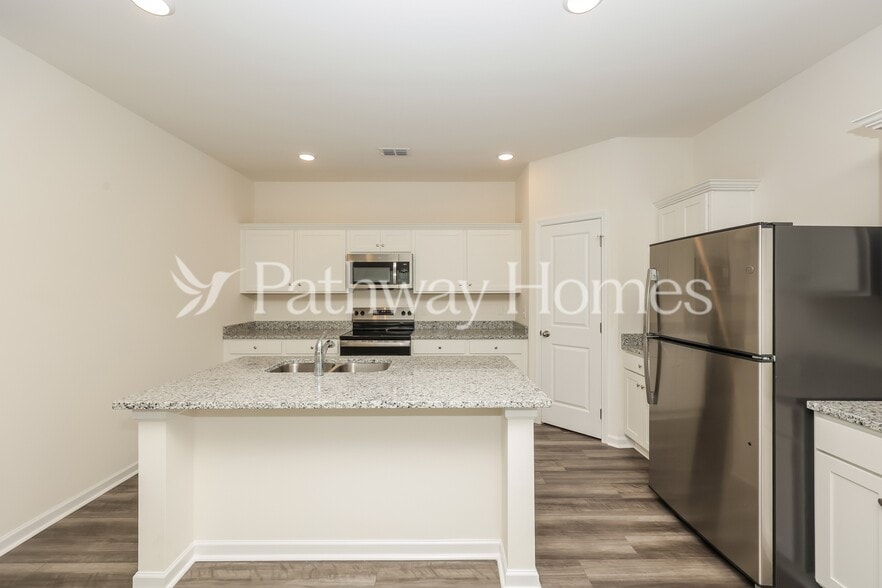 Building Photo - 209 Wild Daisy Wy