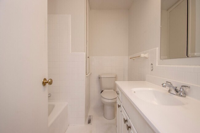 Building Photo - Welcome to a beautifully maintained 4-bedroom, 2-bathroom home located in the highly sought-after...