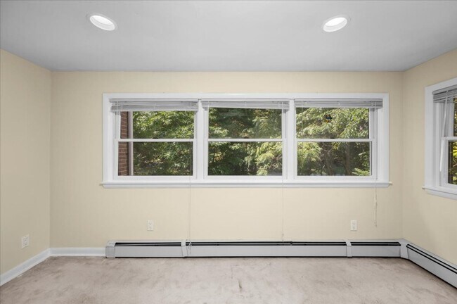 Building Photo - Elegant Multi-Level Brick Residence with Outdoor Oasis