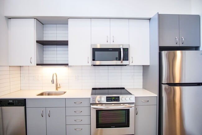Building Photo - Modern & Chic 1-Bedroom w/Condo-Grade Finishes & $500 OFF!