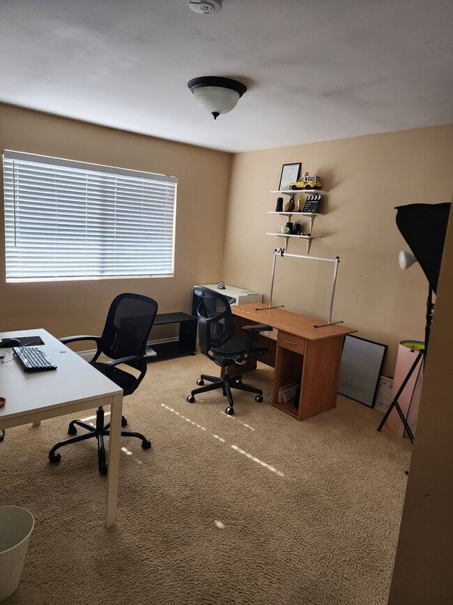 Building Photo - Upstairs end unit with AC and a private entrance 2 bedroom condo in a quiet area of Spring Valley...