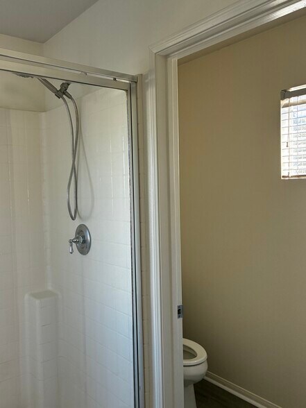 The private toilet room is right of shower. - 1617 Norton St