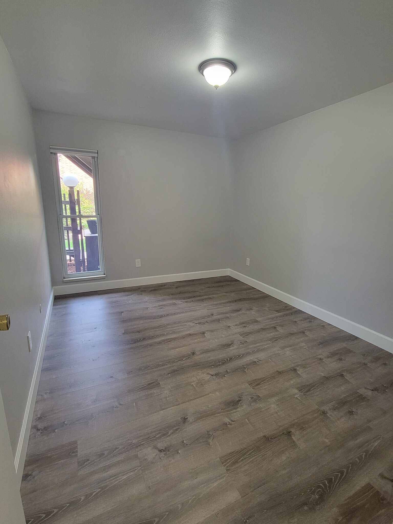 Large Bedroom-brand new flooring - 3663 S Sheridan Blvd
