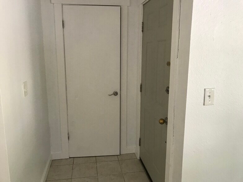 7834 coat closet by front door - 7834 Custer Rd W
