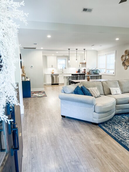 Open concept living, dining and kitchen - 303 Woodland Shores Rd