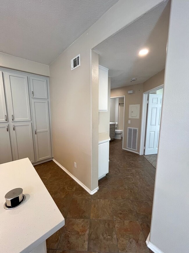 Building Photo - PICTURE PERFECT!  3 BR/3 BA END UNIT CONDO with DIRECT ACCESS 2 CAR GARAGE