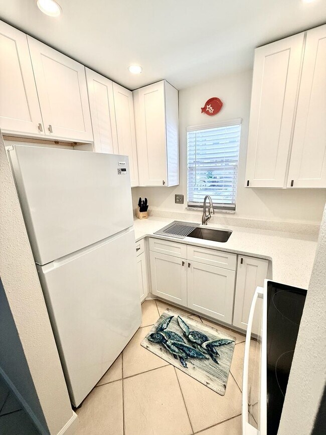 Building Photo - New throughout and on the Beach!  Sea Villas +55 Community