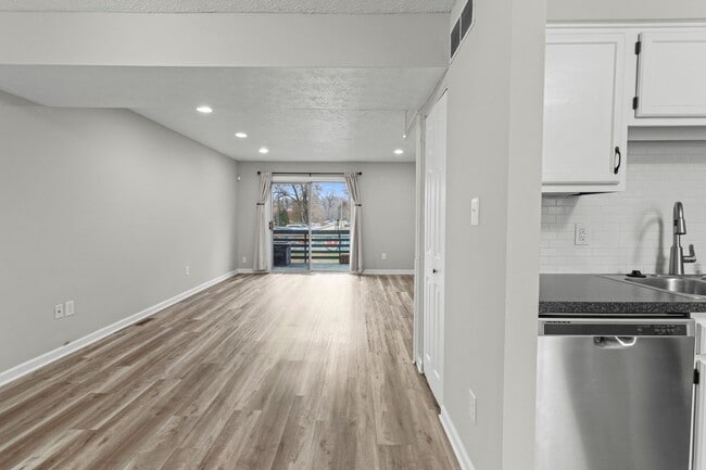 Building Photo - Broad Ripple townhome with garage, updated kitchen, and walkable convenience!