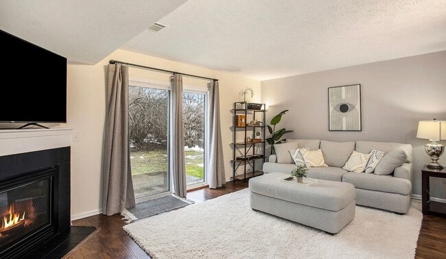 Building Photo - Charming 3-Bedroom End Unit Condo – Prime ...
