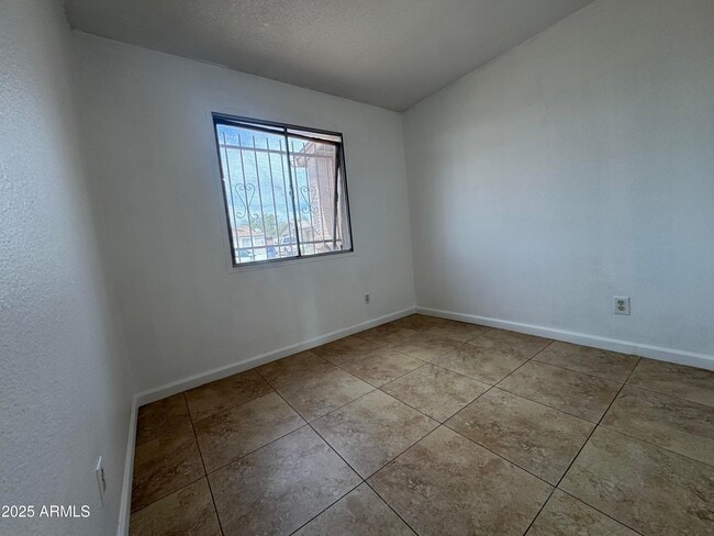 Building Photo - 7967 W Highland Ave