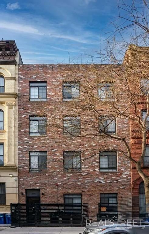 Building Photo - Prime Williamsburg 3-Bedroom with Private Backyard + Laundry in Building