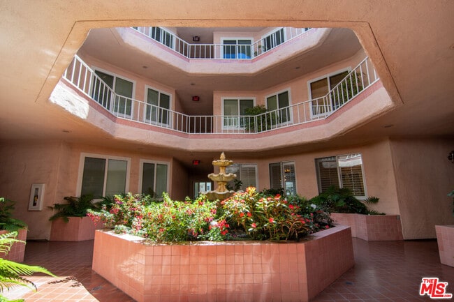 Building Photo - 10373 Almayo Ave