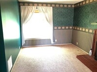 Building Photo - "Charming 3-Bedroom Retreat with Fireplace & Spacious 3100 Sq Ft Layout in Independence, KS!"