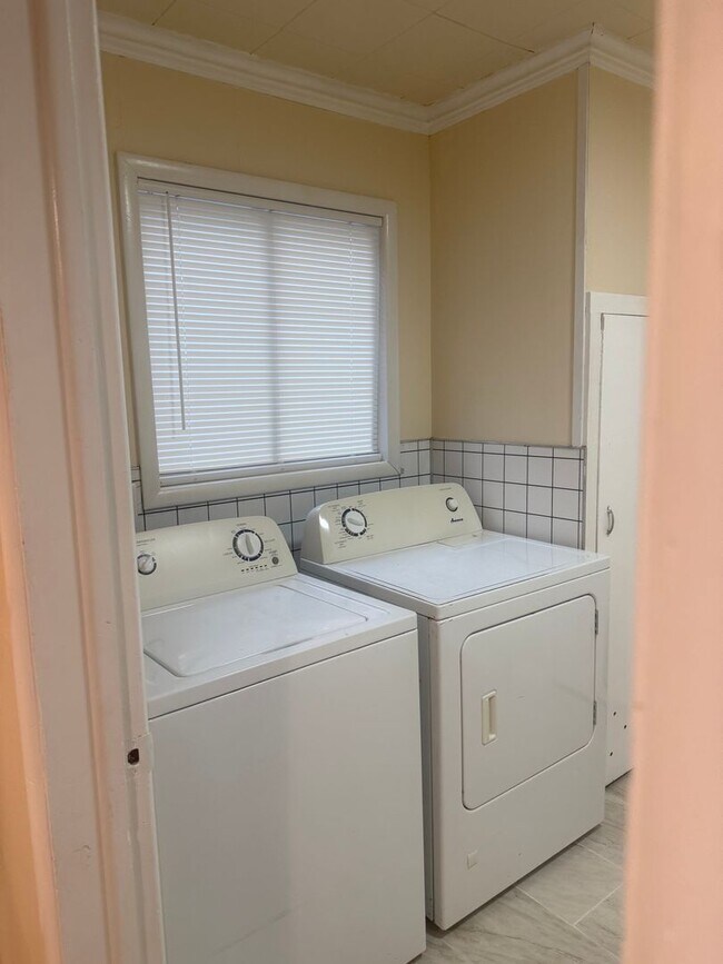 Building Photo - Step into this beautifully updated 1950's gem, where charm meets modern convenience